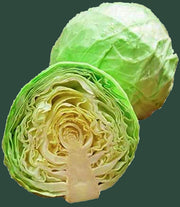 a fresh head of cabbage, with a slice cut out to reveal the layers of the vegetable.